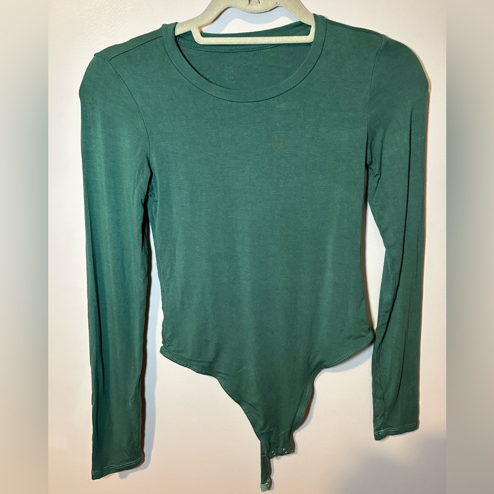 Vitality, green body suit small